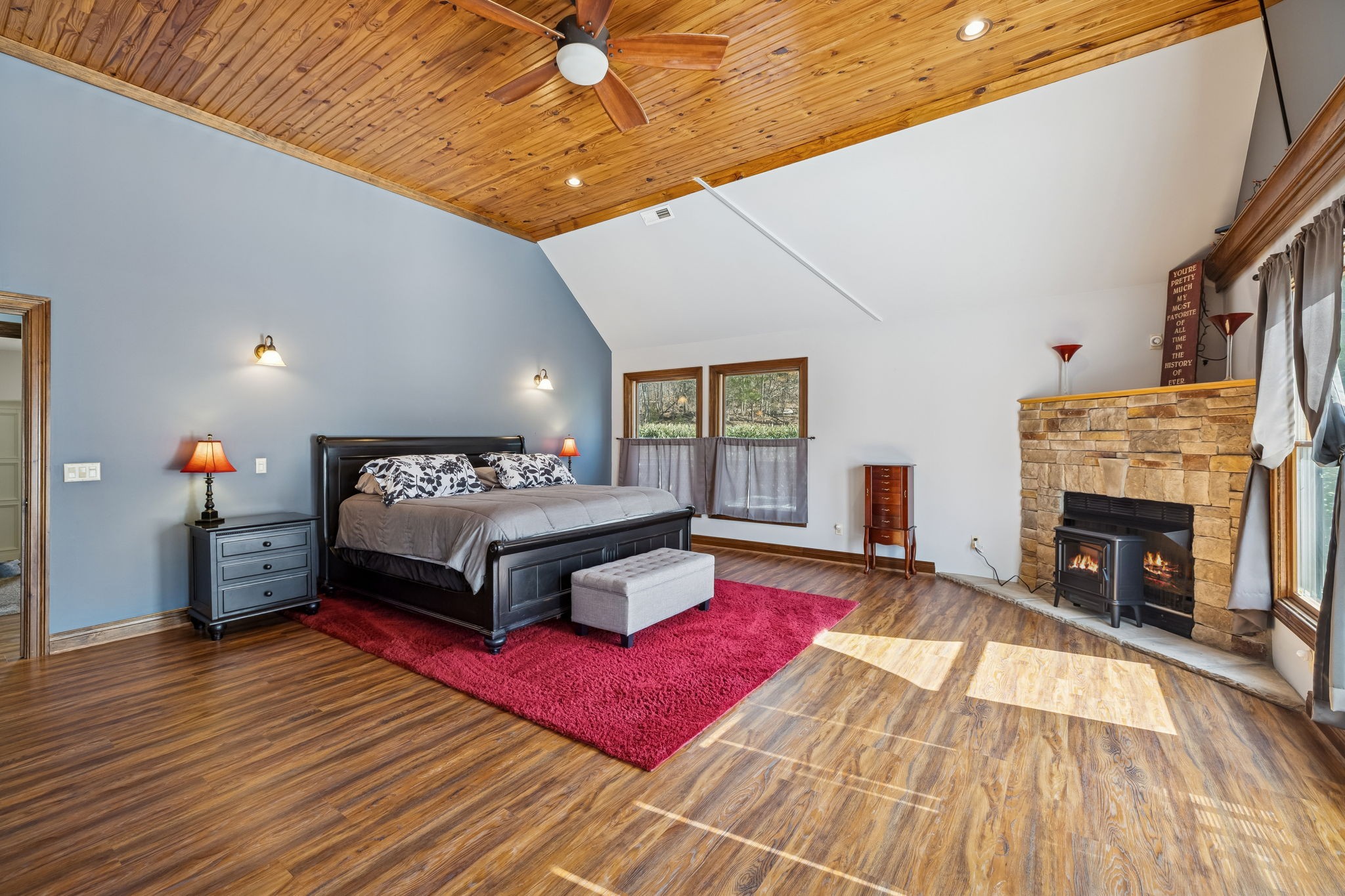 480 Defeated Creek Road Centerville, TN 37033 - Photo 22 of 97 a bedroom with a bed and a fireplace