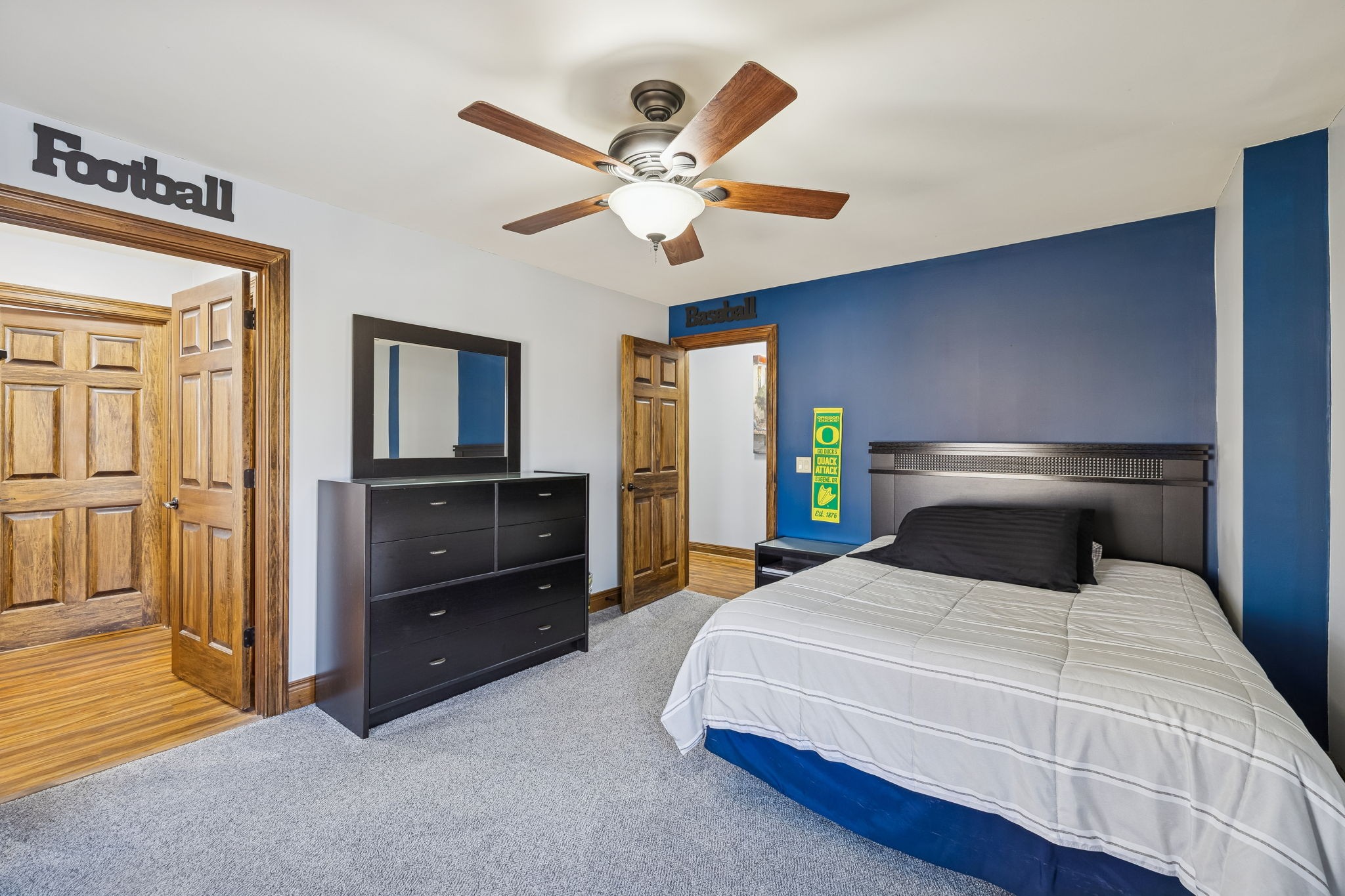 480 Defeated Creek Road Centerville, TN 37033 - Photo 32 of 97 a bedroom with a bed and a chandelier