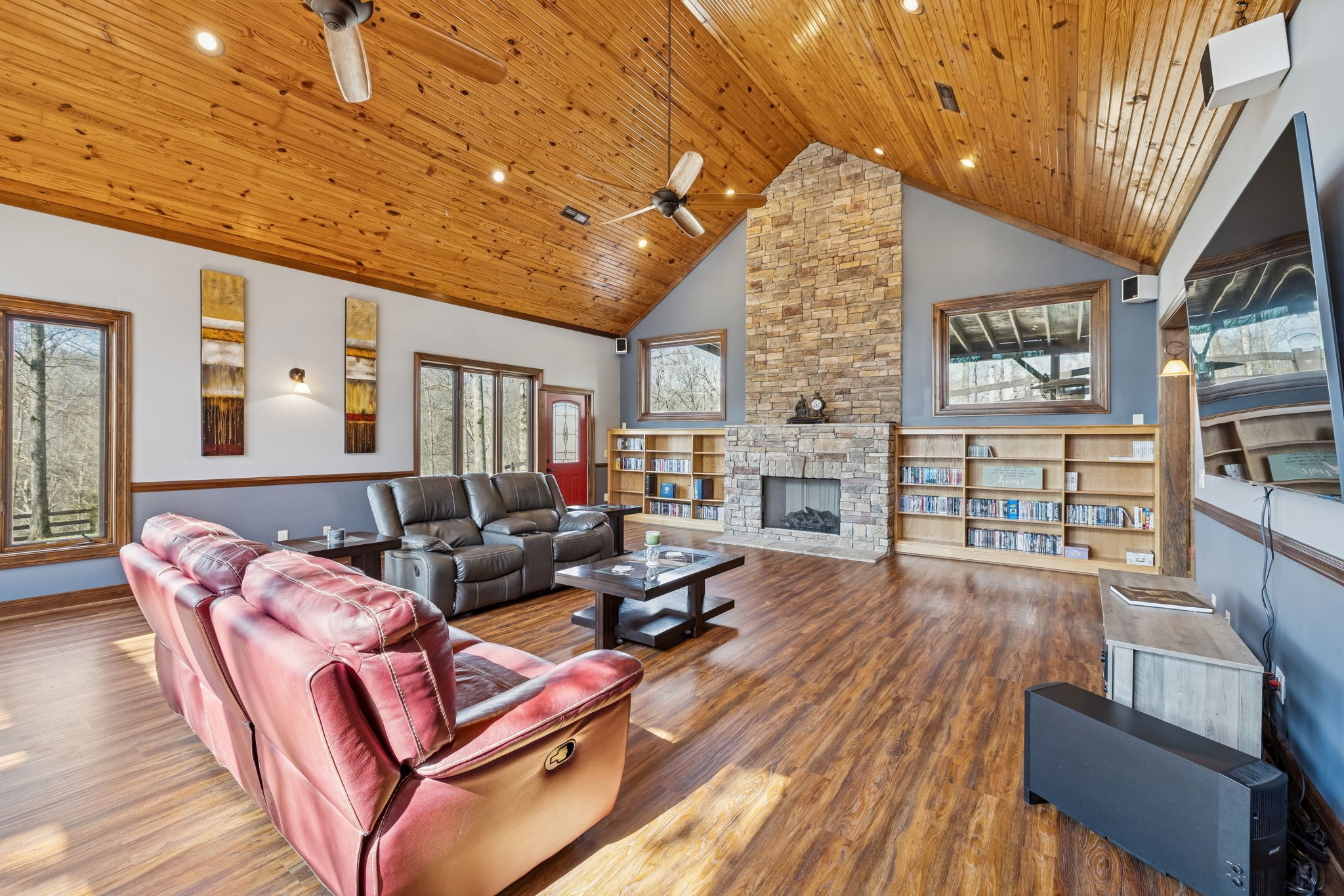 480 Defeated Creek Road Centerville, TN 37033 - Photo 7 of 97 a living room with furniture fireplace and wooden floor