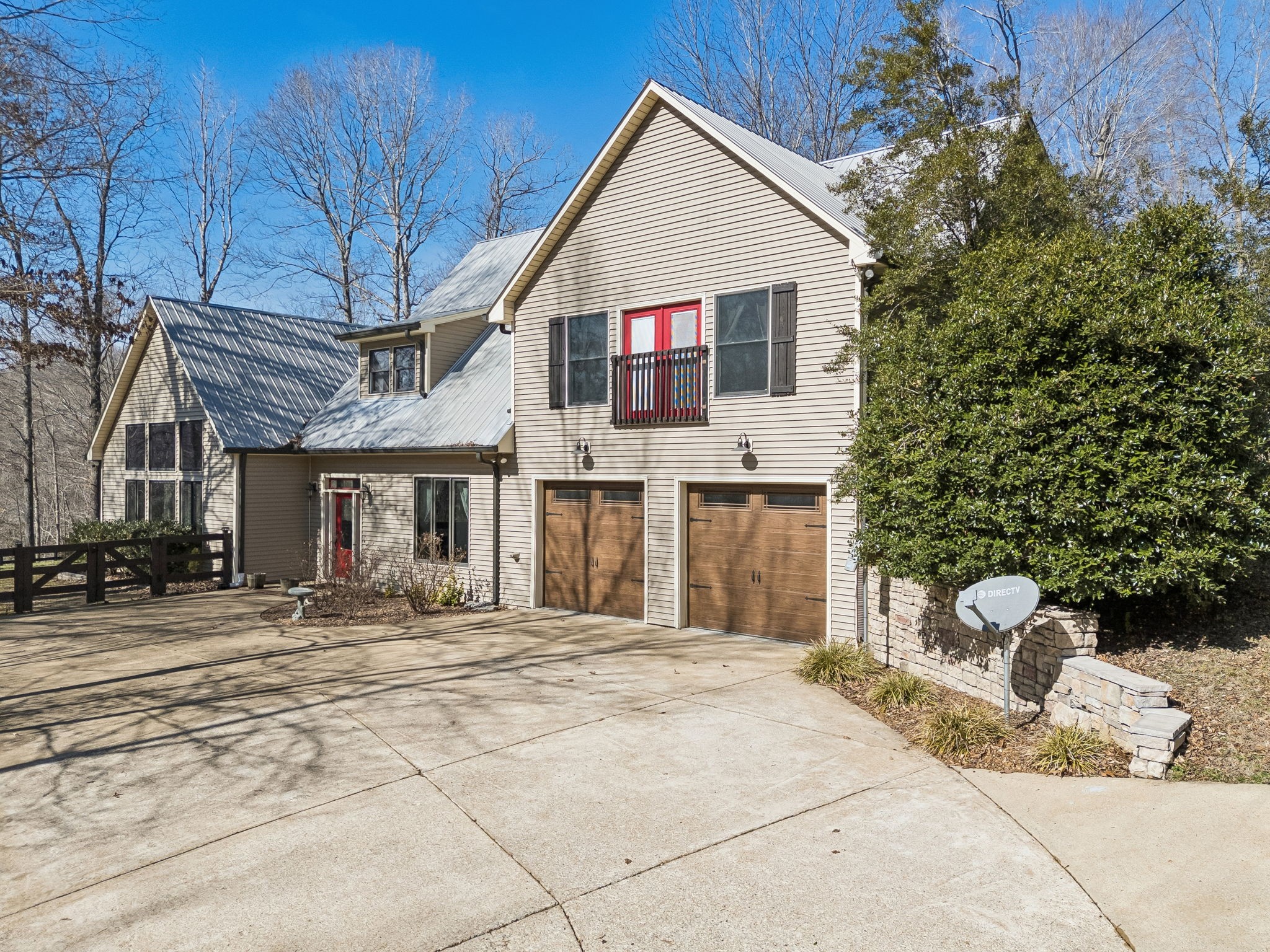 480 Defeated Creek Road Centerville, TN 37033 - Photo 74 of 97 a front view of a house with a yard and garage
