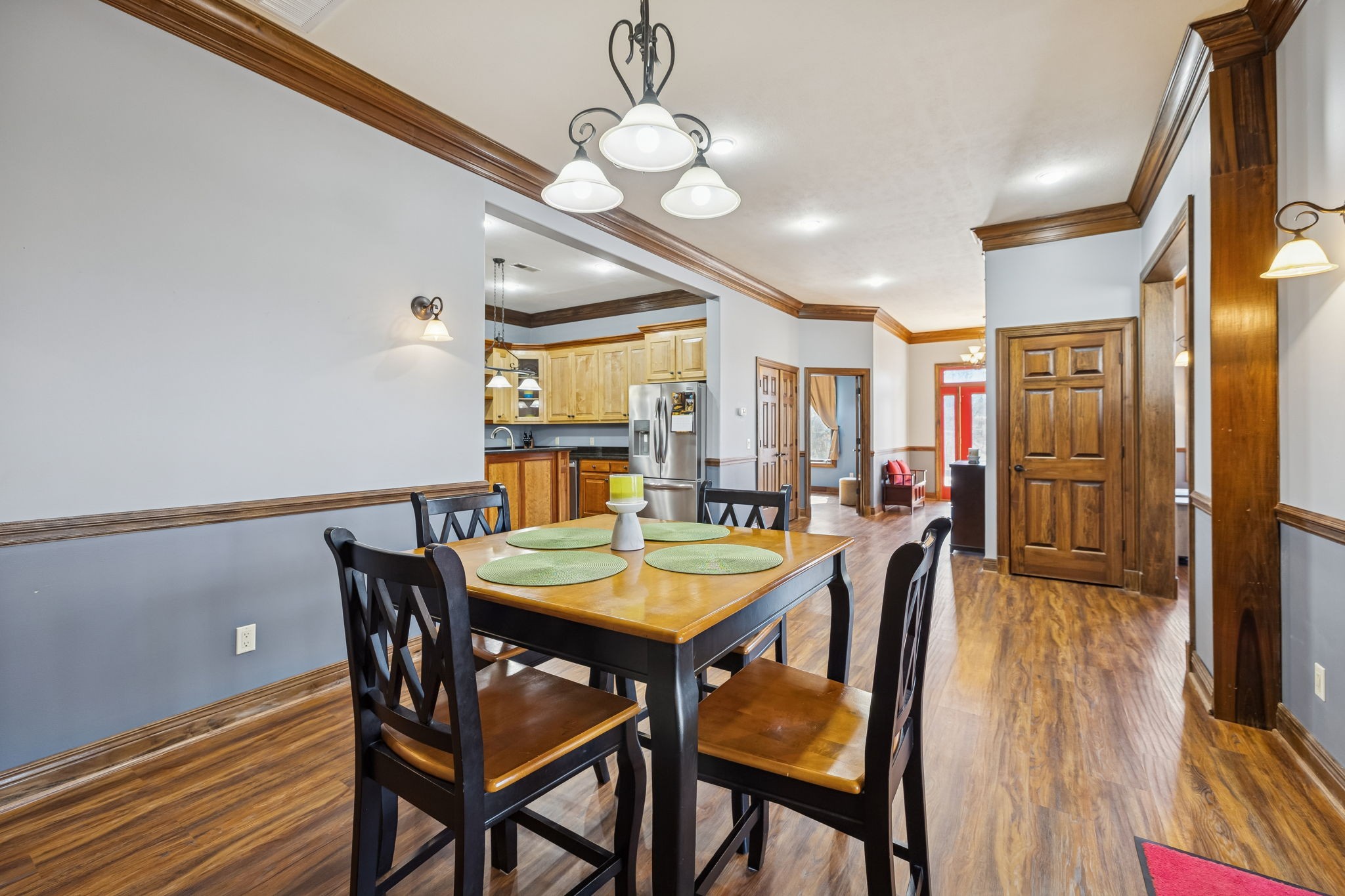 480 Defeated Creek Road Centerville, TN 37033 - Photo 82 of 97 a view of a dining room with furniture and a chandelier