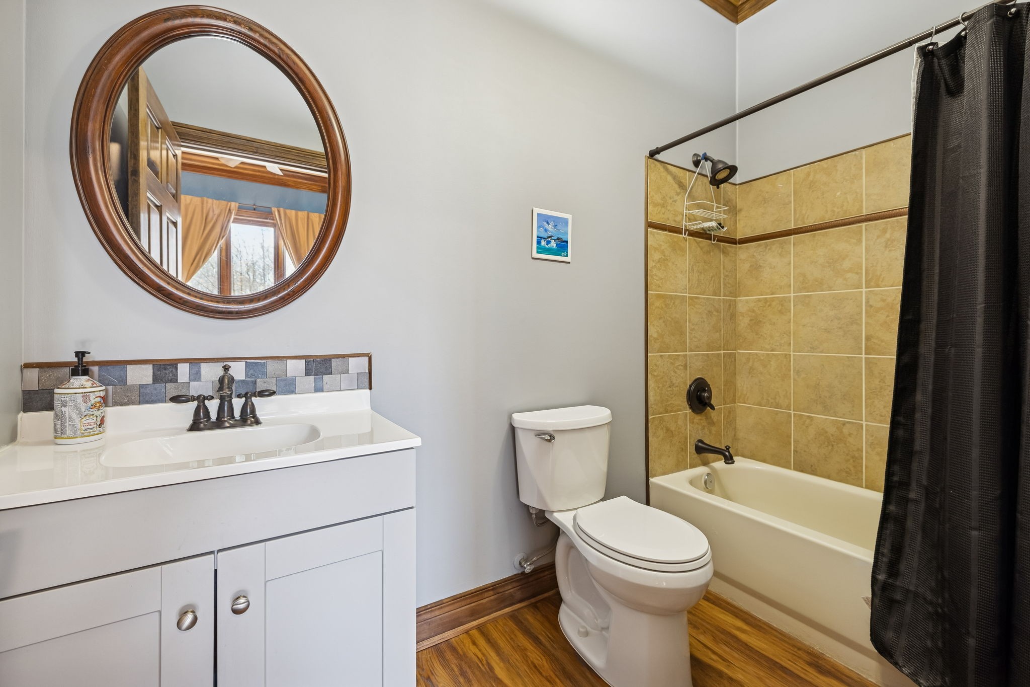 480 Defeated Creek Road Centerville, TN 37033 - Photo 91 of 97 a bathroom with a sink a toilet and a mirror