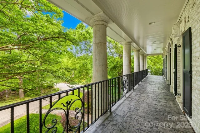 a bed room with furniture and wooden floor