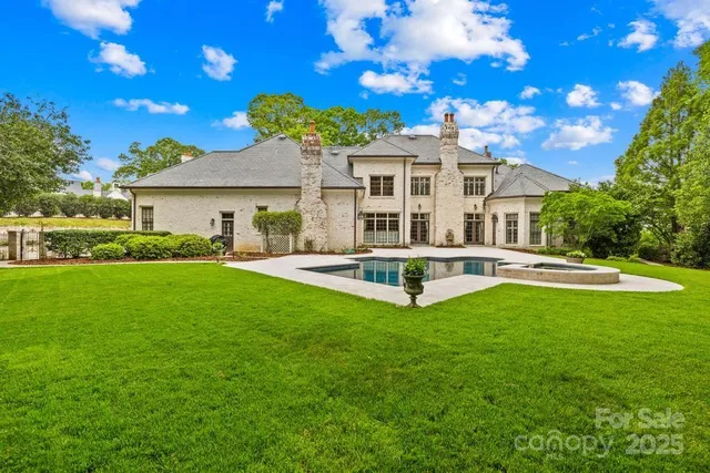 a view of a back yard with green space
