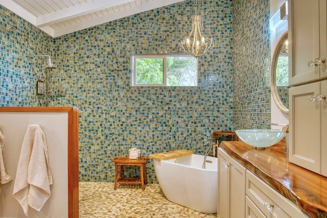 a bed room with a bed and a window