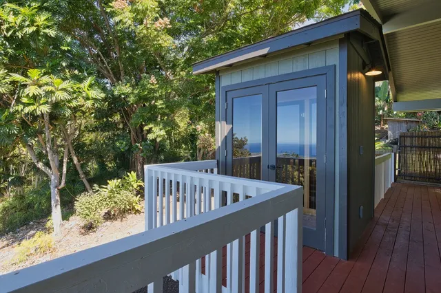 a view of a backyard of the house
