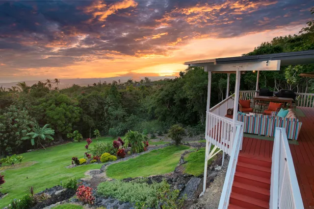 a view of a patio with furniture