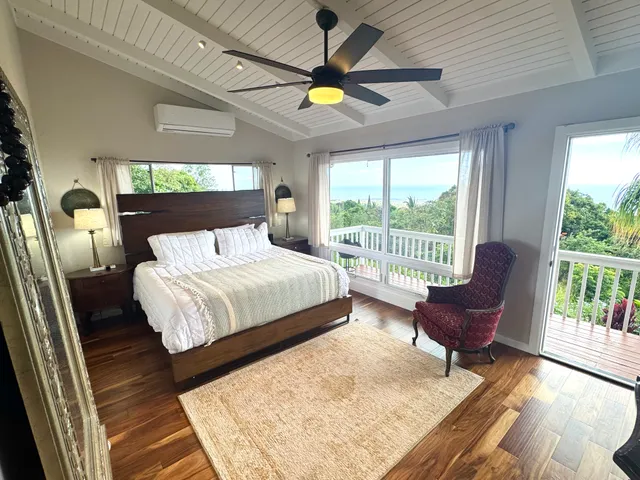 a bathroom with a toilet a sink and a mirror