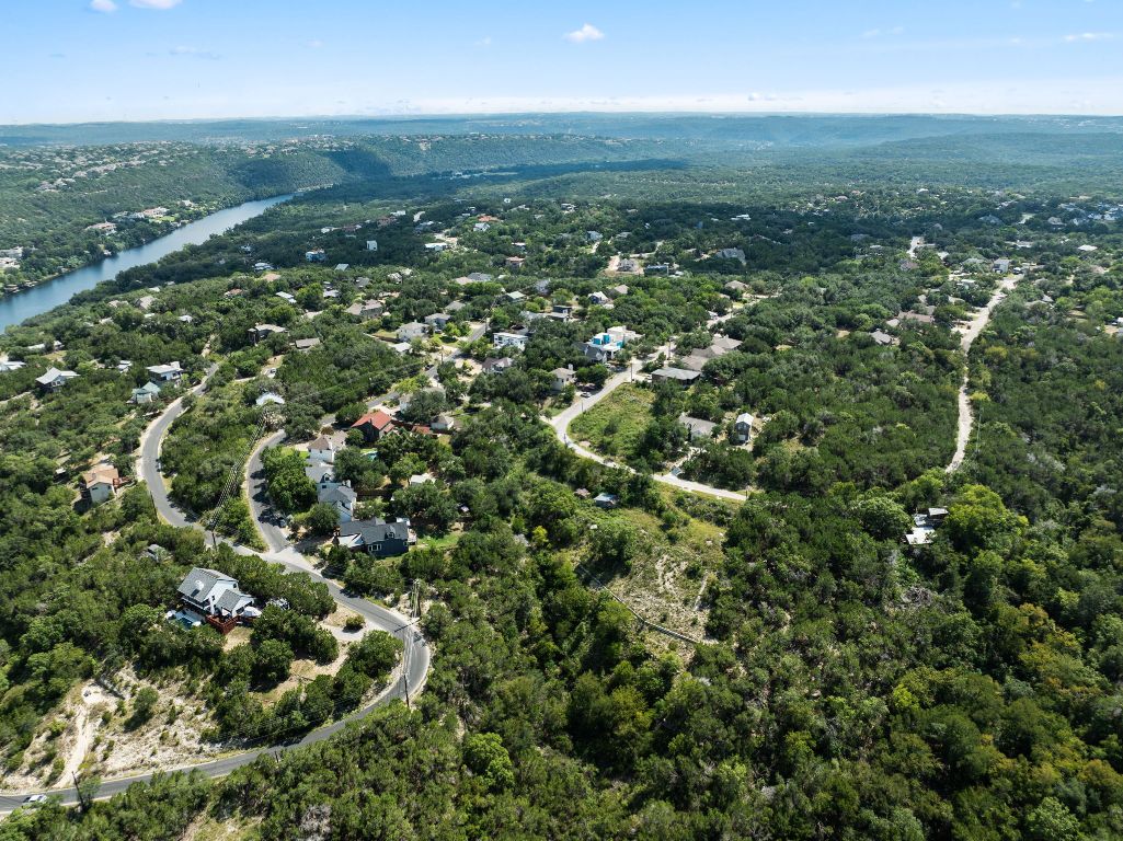 2314 Little Beaver Trail Austin, TX 78734 - Photo 34 of 39 an aerial view of residential houses with city view and green space