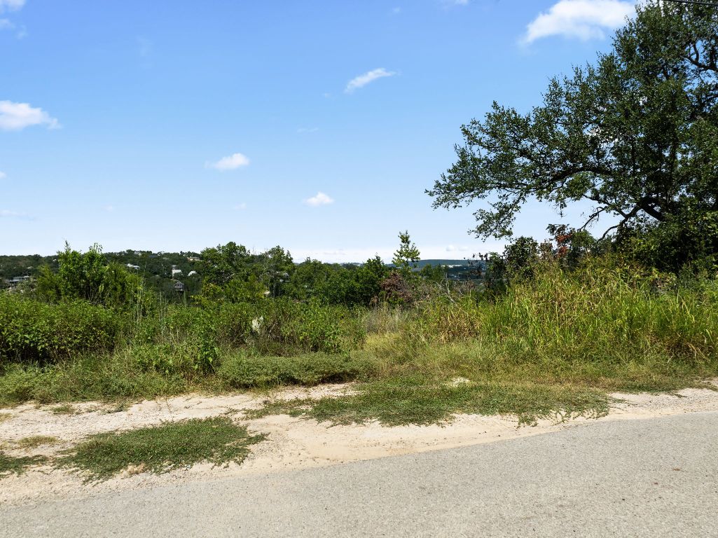2314 Little Beaver Trail Austin, TX 78734 - Photo 5 of 39 a view of a lake with houses in the background