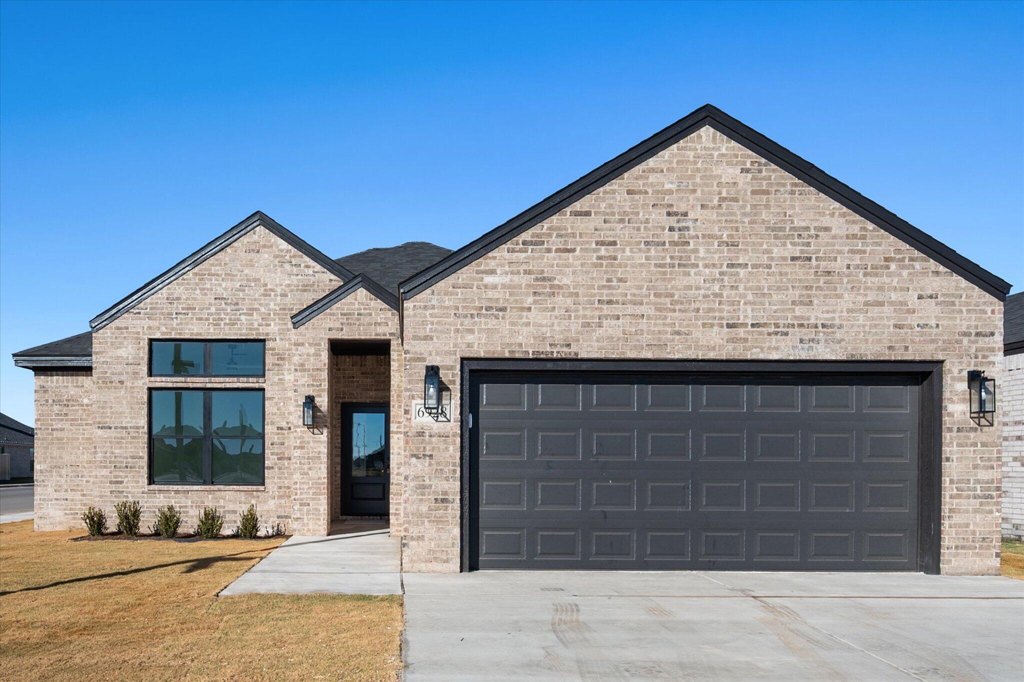 a view of front of house with a outdoor space