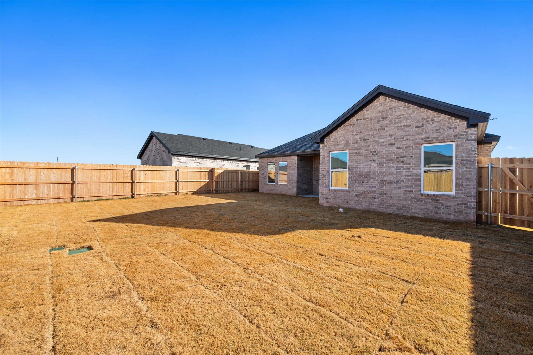 6928 14th Street Lubbock, TX 79416 - Photo 33 of 33 a view of an house with backyard space