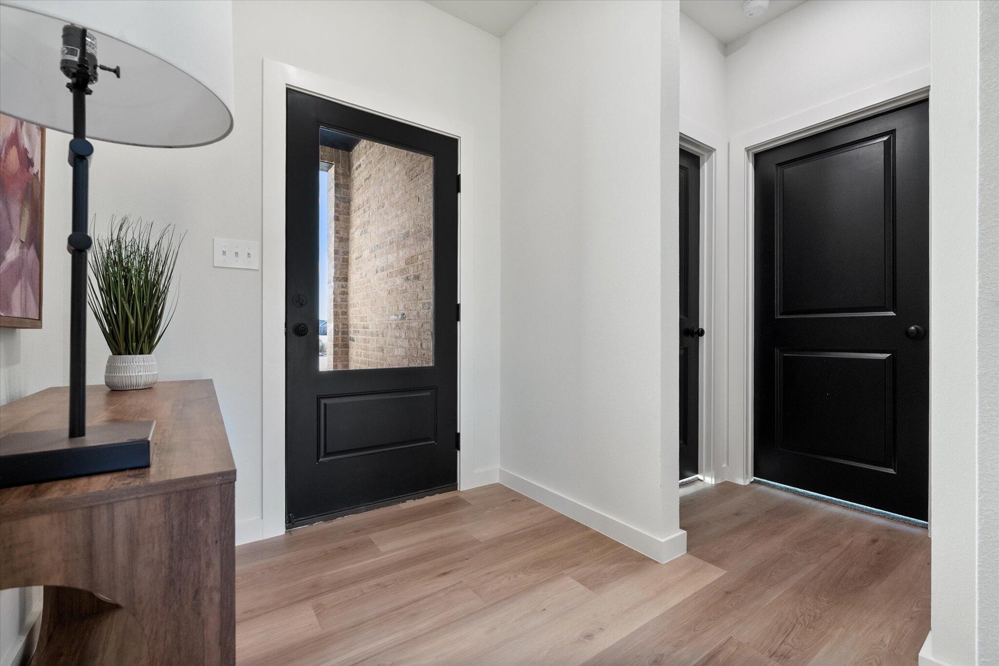 6928 14th Street Lubbock, TX 79416 - Photo 5 of 33 a view of an entryway door