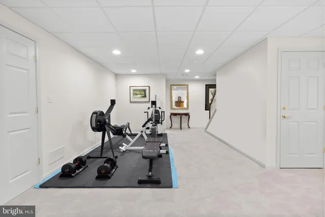 a room with furniture and wooden floor