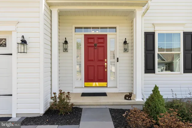 a front view of a house with a garage