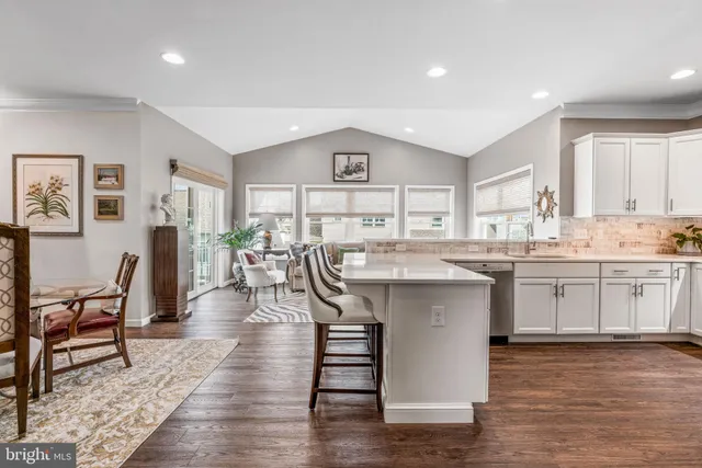 a very nice looking kitchen with a large window