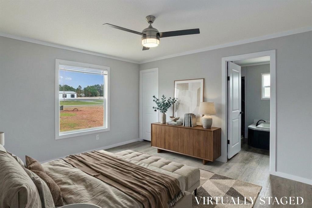 607 Nettleton Drive Princeton, LA 71067 - Photo 5 of 14 a bedroom with a bed and a window