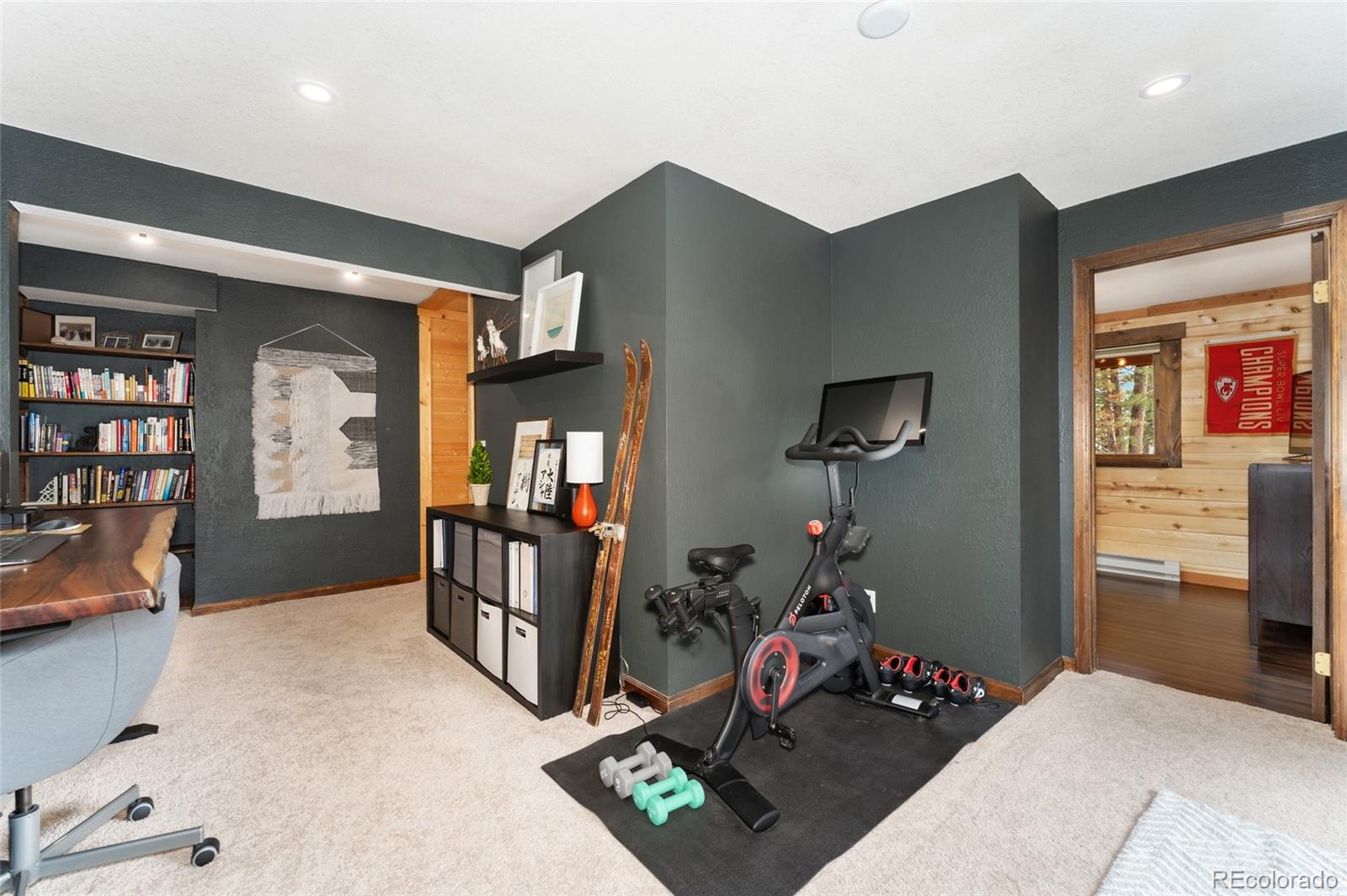 24333 Bent Feather Road Conifer, CO 80433 - Photo 27 of 50 a bedroom with bed and a window