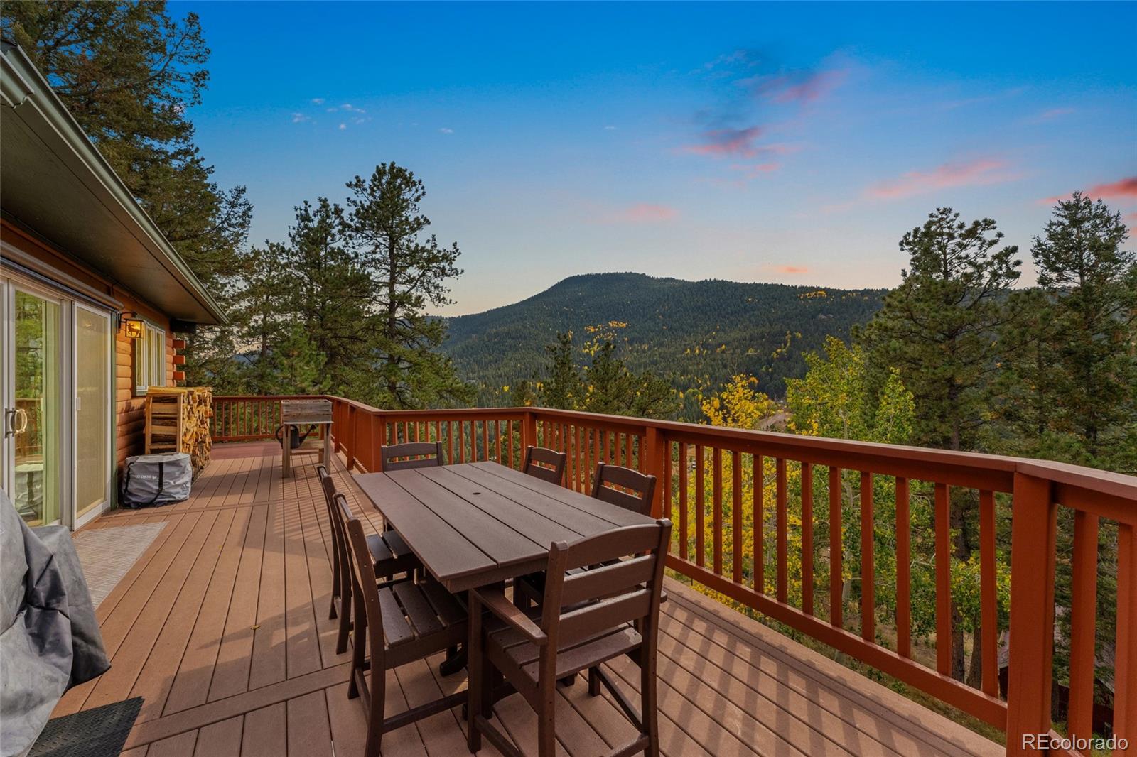 24333 Bent Feather Road Conifer, CO 80433 - Photo 49 of 50 a view of deck with patio