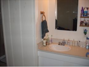 1295 Prairiegrass Road, Unit 2 Chino Valley, AZ 86323 - Photo 8 of 8 a bathroom with a sink and a mirror