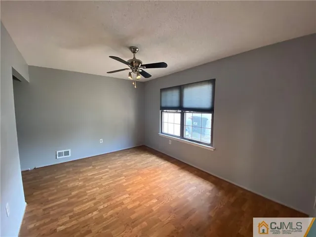 a view of a room with a chandelier
