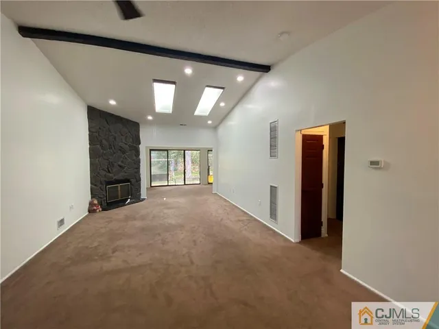 an empty room with windows