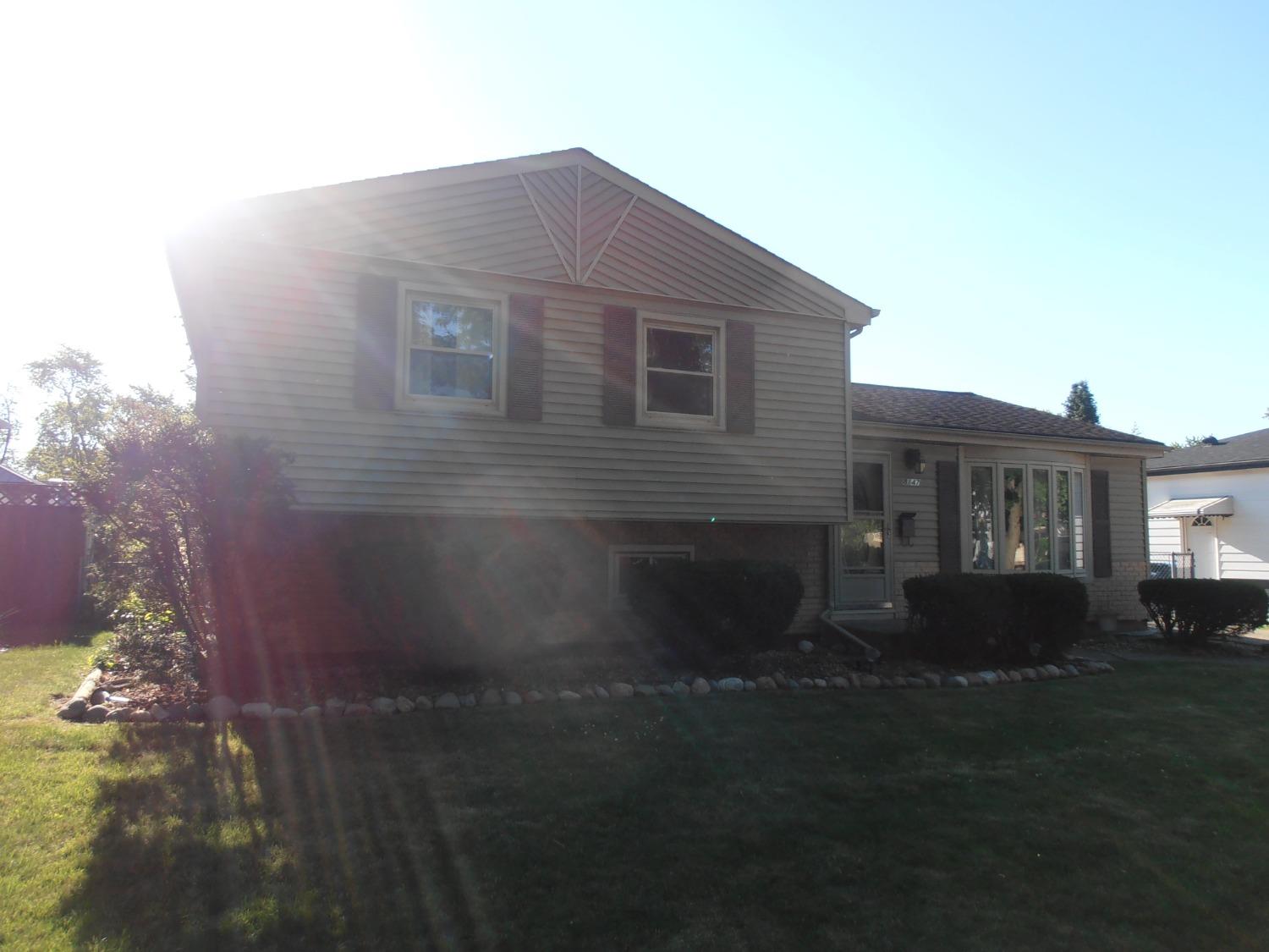 8147 Grace Street Highland, IN 46322 - Photo 1 of 1 a front view of house with yard and green space