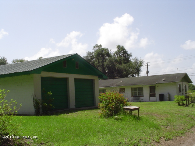 710 Huntington Road Crescent City, FL 32112 - Photo 4 of 5 back view of house and garage