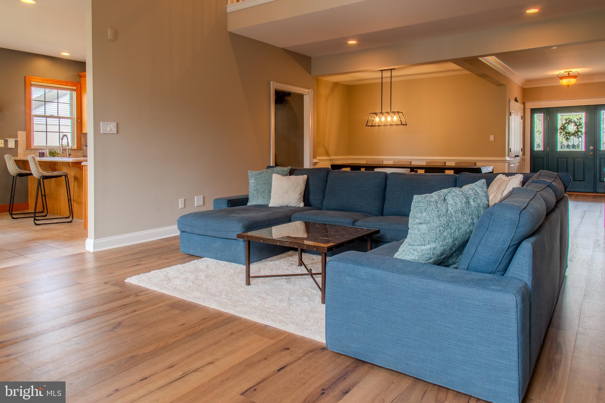 33 Evesham Avenue Marlton, NJ 08053 - Photo 12 of 45 a living room with furniture and a wooden floor