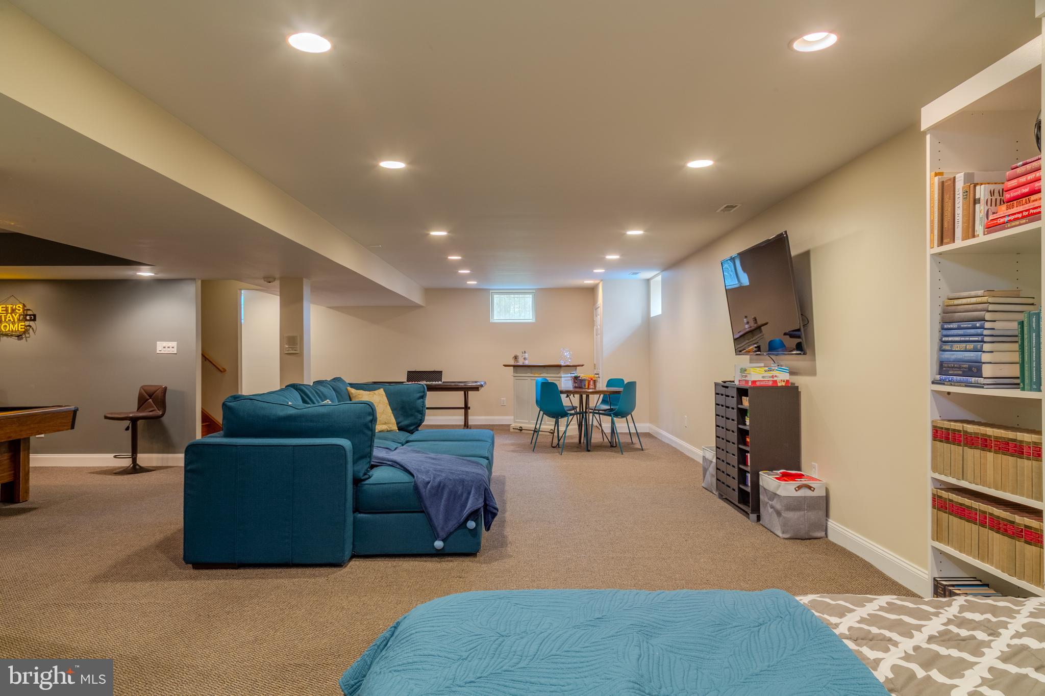 33 Evesham Avenue Marlton, NJ 08053 - Photo 39 of 45 a living room with furniture and a flat screen tv