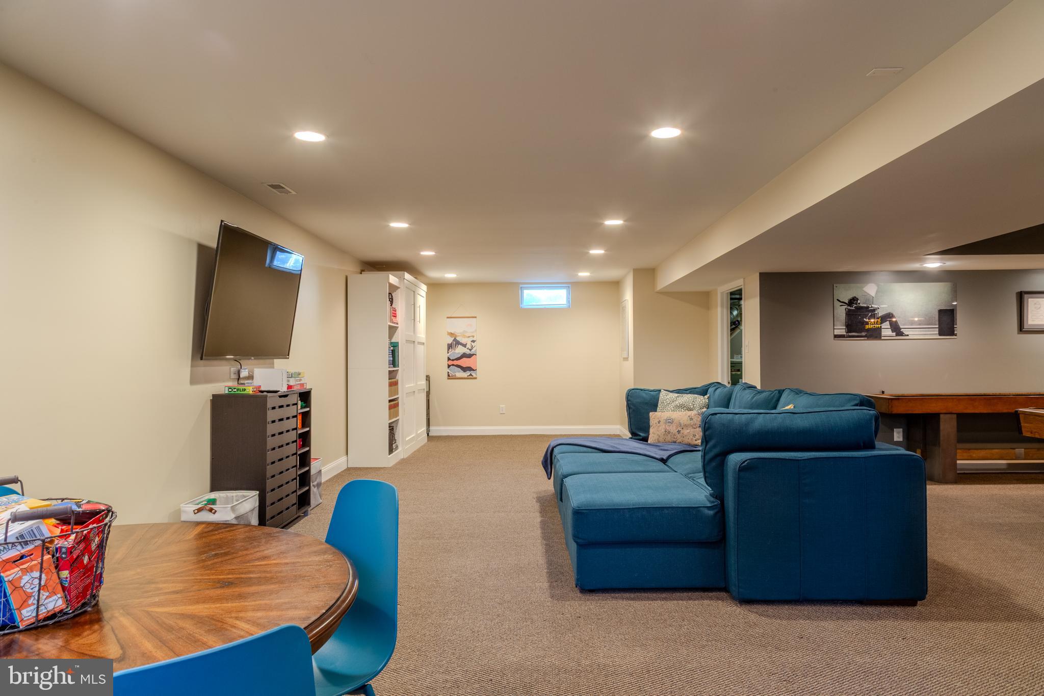 33 Evesham Avenue Marlton, NJ 08053 - Photo 40 of 45 a living room with furniture and a flat screen tv