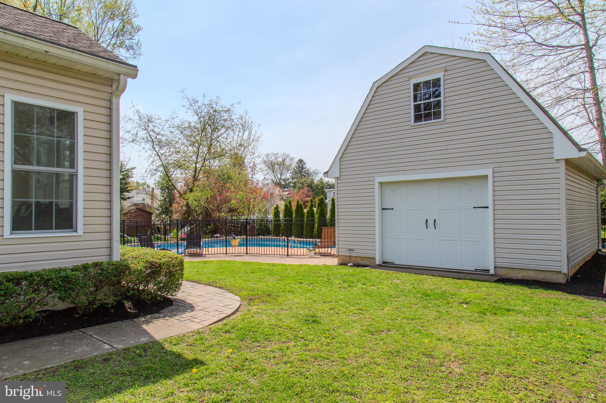 33 Evesham Avenue Marlton, NJ 08053 - Photo 10 of 45 a view of a backyard with a garden