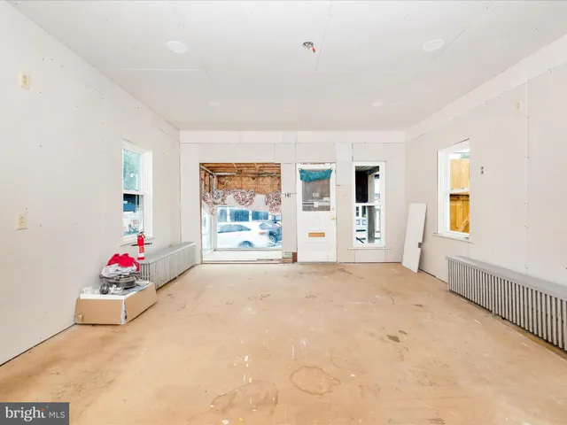 a bathroom with a shower and a sink