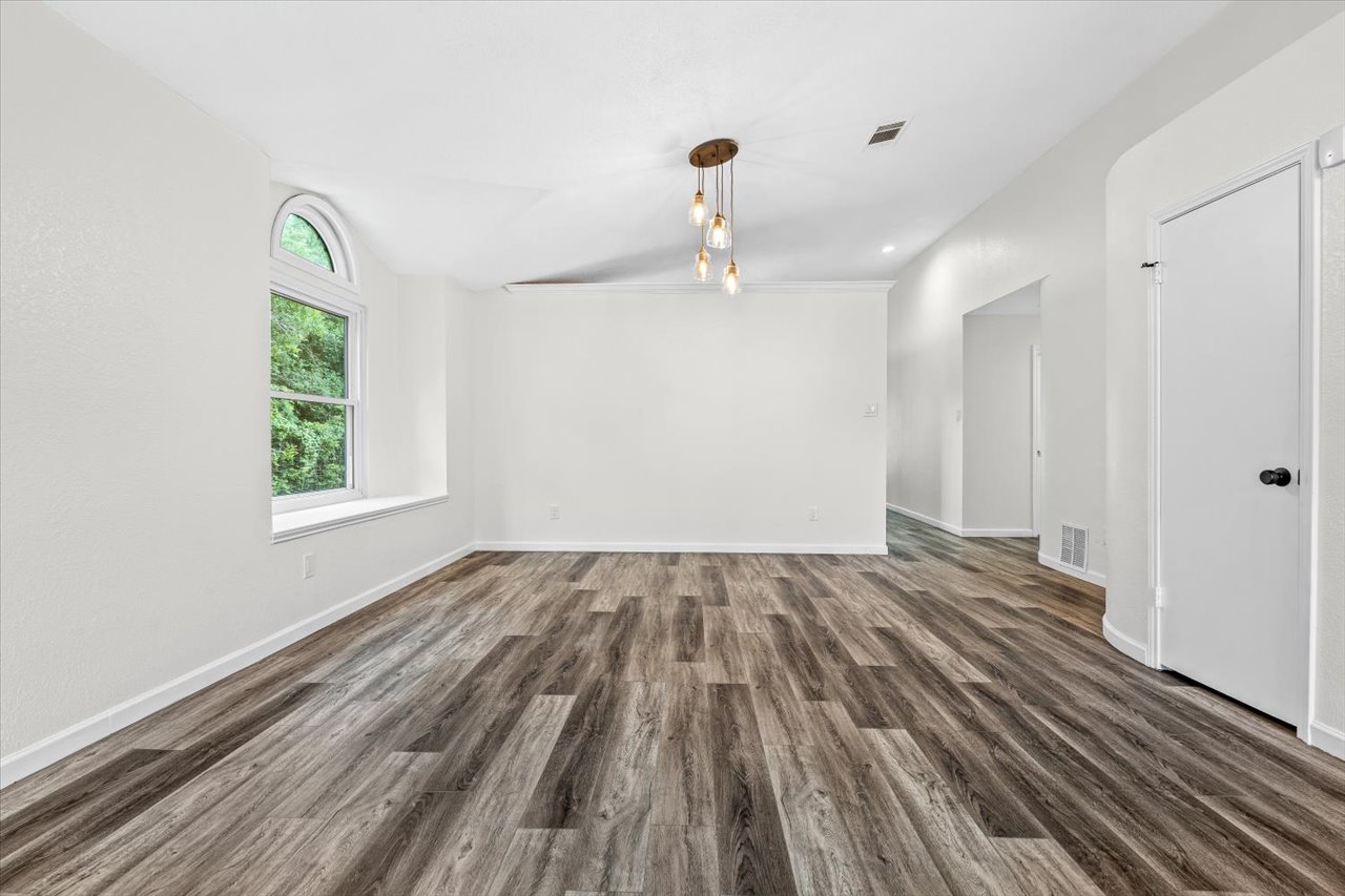 4004 Danli Lane Austin, TX 78749 - Photo 6 of 40 a view of empty room with wooden floor