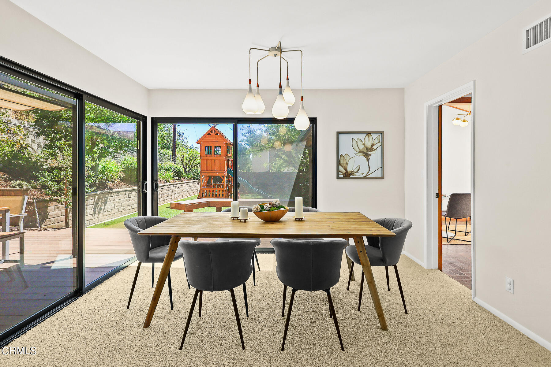 3451 Brookhill Street Glendale, CA 91214 - Photo 21 of 65 a view of a dining room with furniture window and wooden floor