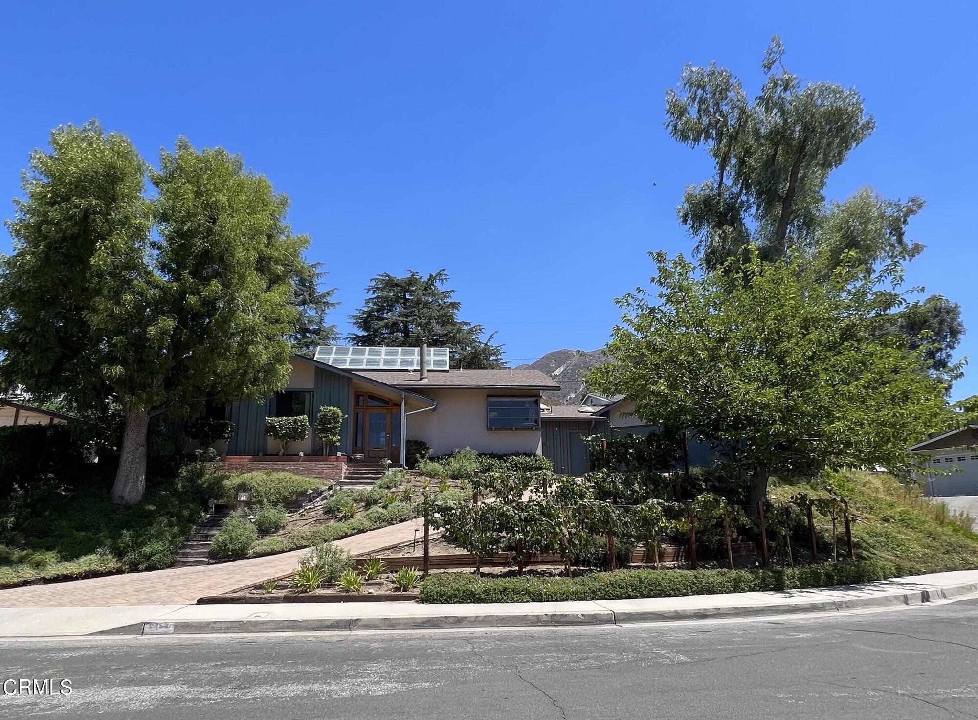 3451 Brookhill Street Glendale, CA 91214 - Photo 3 of 65 a front view of a house with a yard