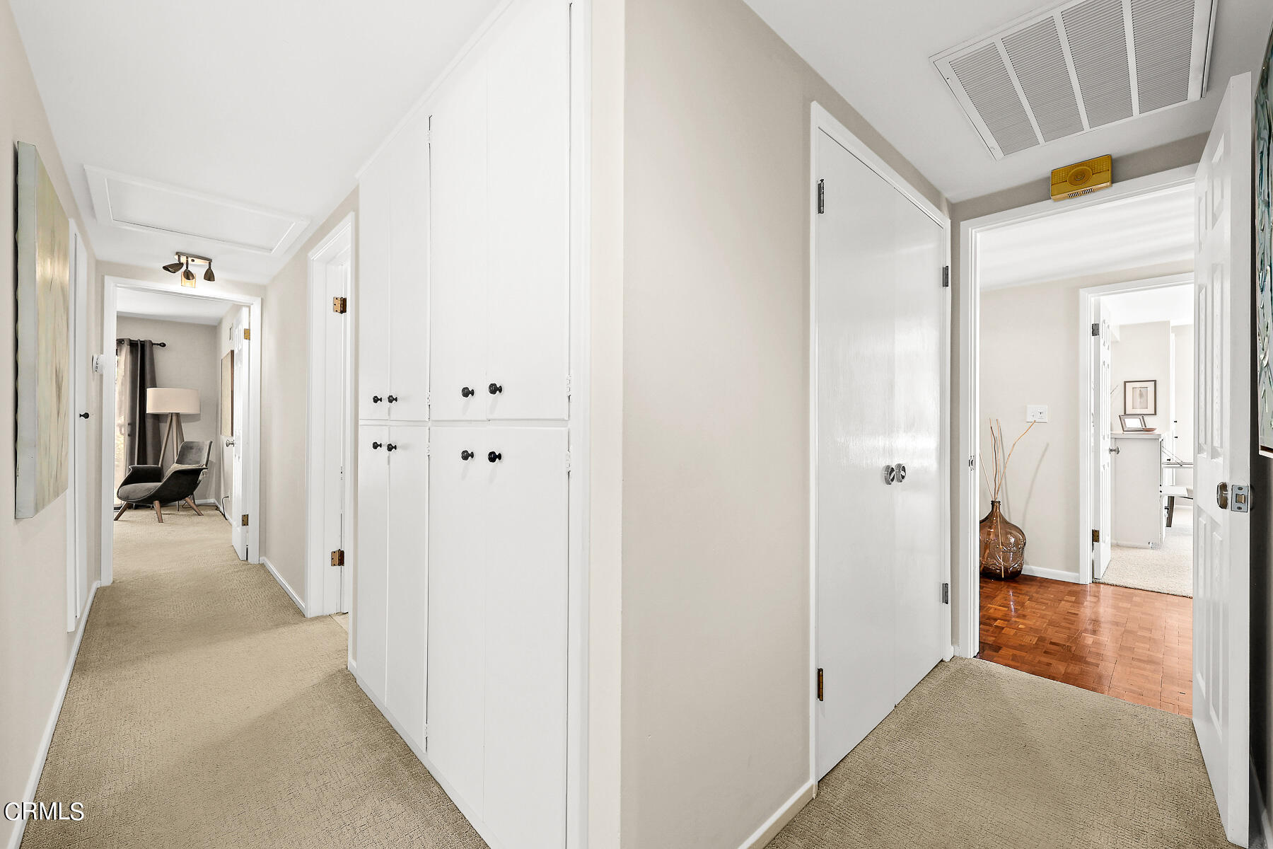 3451 Brookhill Street Glendale, CA 91214 - Photo 34 of 65 a view of a hallway with wooden shelves