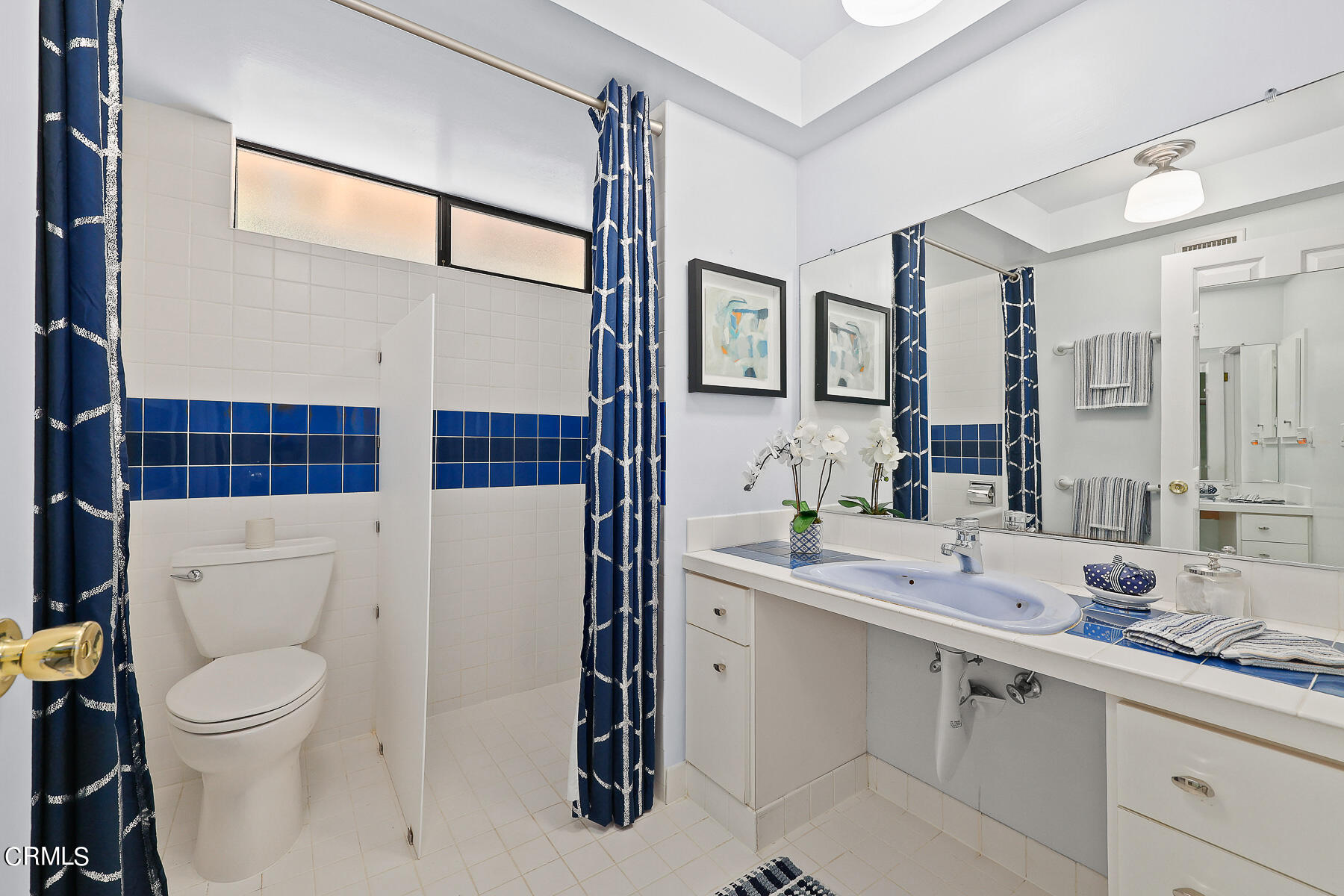 3451 Brookhill Street Glendale, CA 91214 - Photo 38 of 65 a bathroom with a sink a toilet and shower