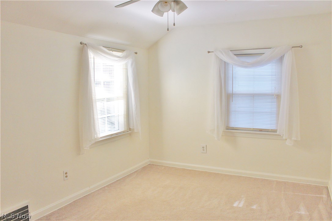 1184 Gordon Road Lyndhurst, OH 44124 - Photo 12 of 22 Bedroom 2 just painted with plush carpet.