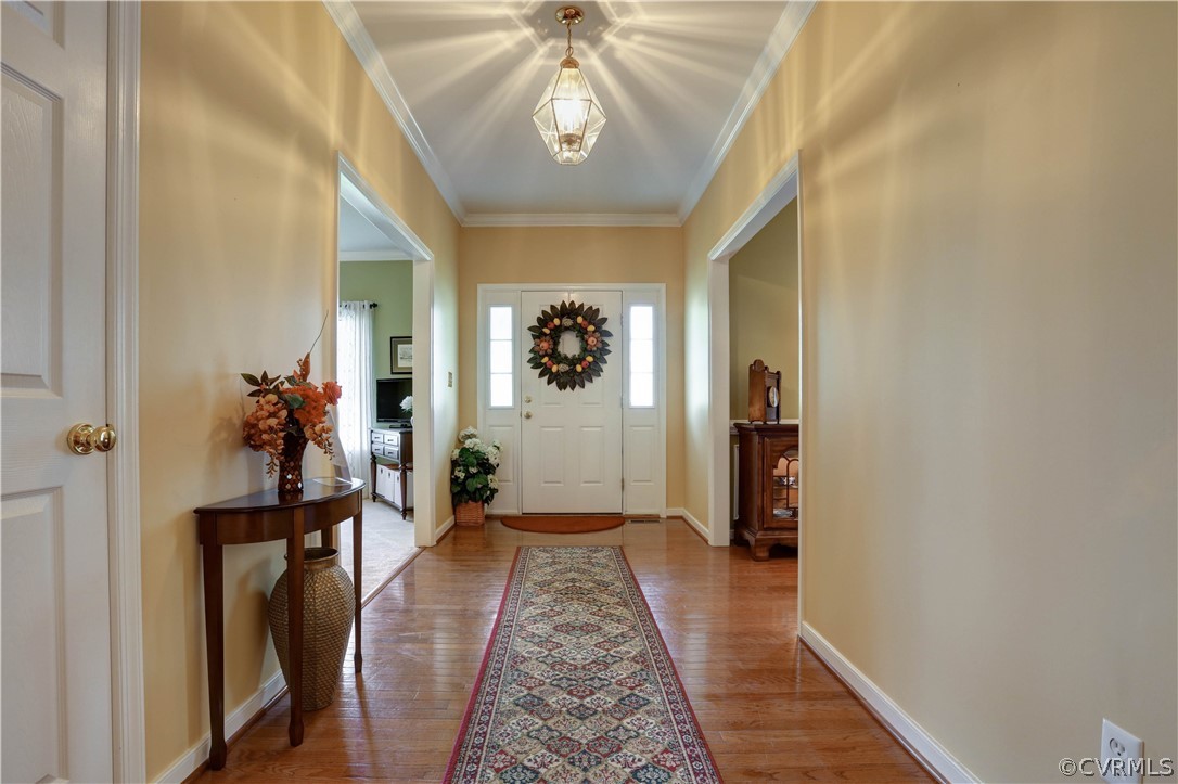 620 Carldan Road Richmond, VA 23227 - Photo 3 of 41 Foyer with hardwood floors, chandelier. Opens to L