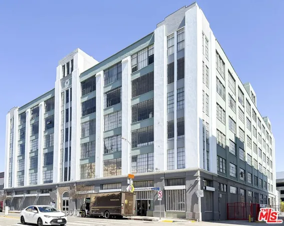 a front view of a building with a street