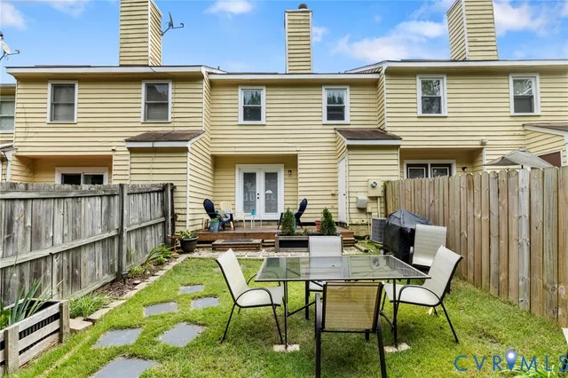 a view of a patio with chairs in patio
