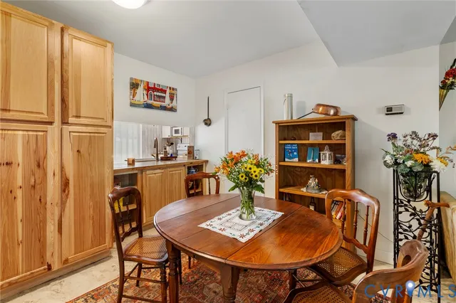 a view of a dining room with furniture
