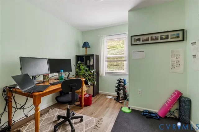 a workspace with furniture and a window