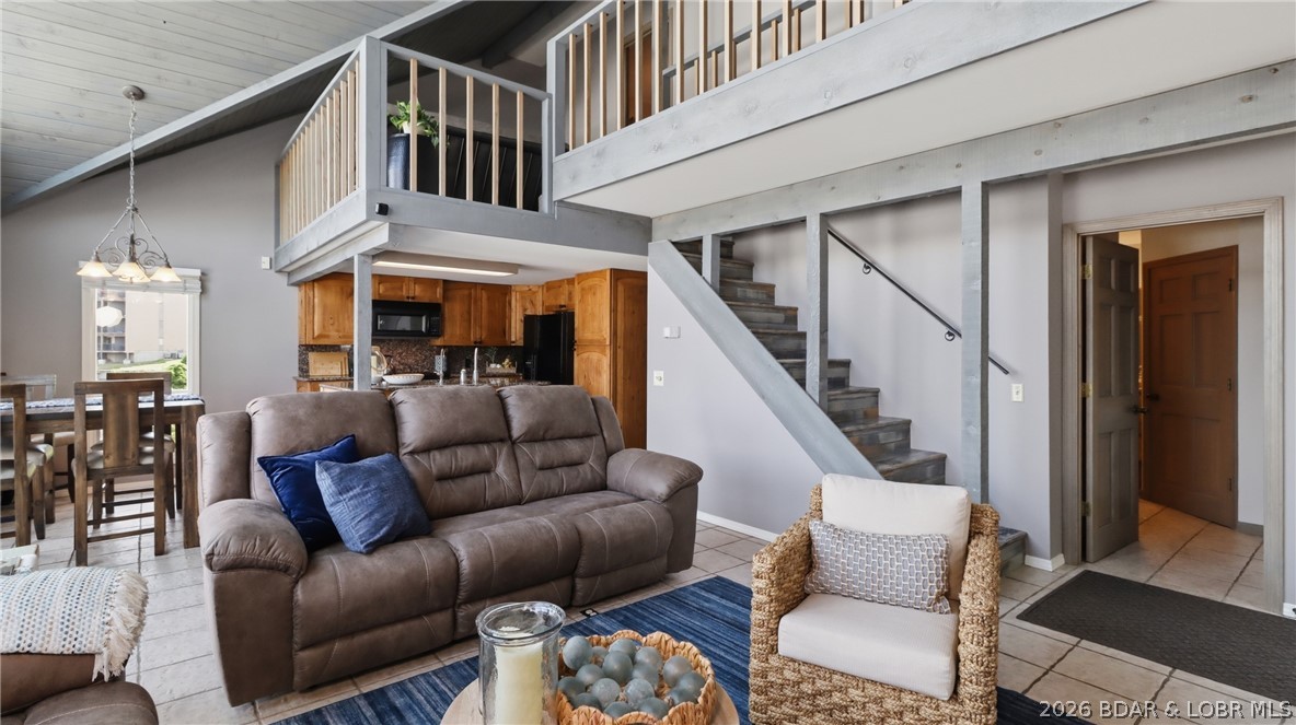 1069 Indian Hill Road Sunrise Beach, MO 65079 - Photo 6 of 54 Tall Vaulted Ceilings