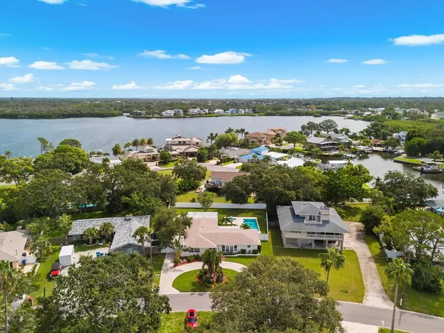 an aerial view of a house with a garden