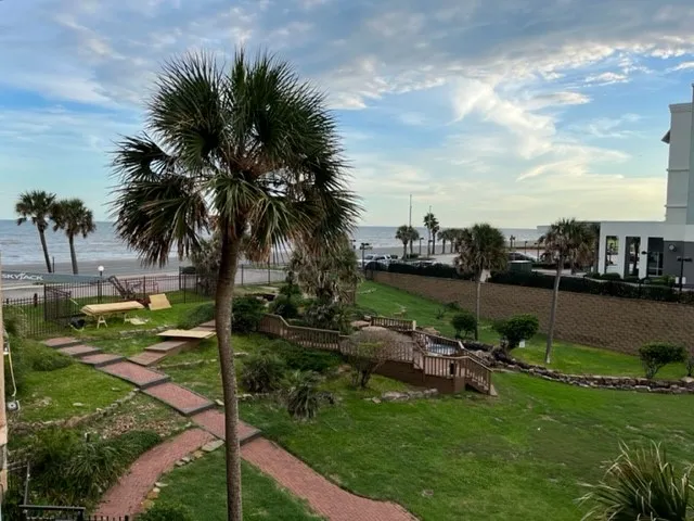 a view of a lake with a big yard