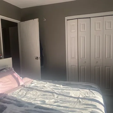 a view of a livingroom with wooden floor