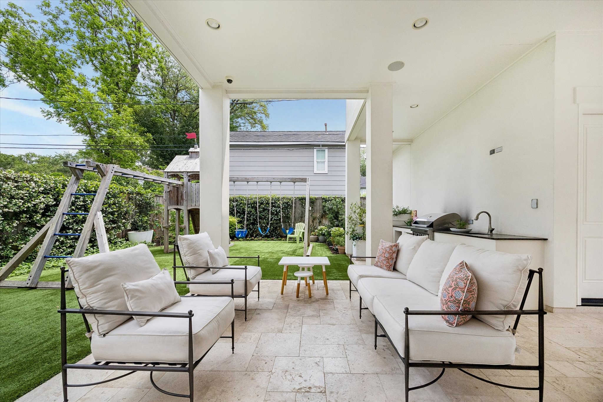 3615 Overbrook Lane Houston, TX 77027 - Photo 14 of 34 a balcony with furniture and a potted plant