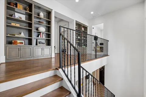 a view of entryway with a window and stairs